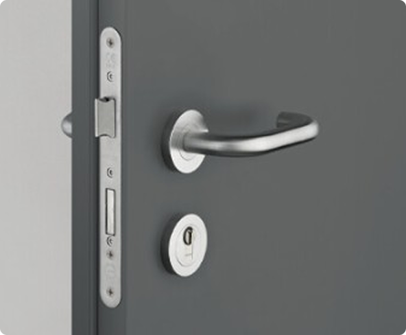 Stacks of quality, precision-cut anthracite grey steel sections and components for Entrad door fabrication.
